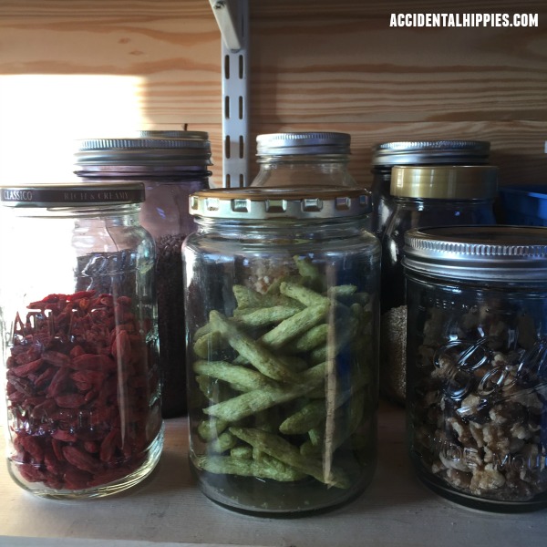 jars of dried goji berries, green beans, and nuts