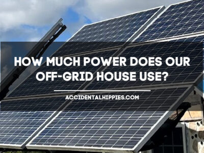 Text: How Much Power Does Our Off-Grid House Use? AccidentalHippies.com; Image: solar panels and a partly cloudy sky